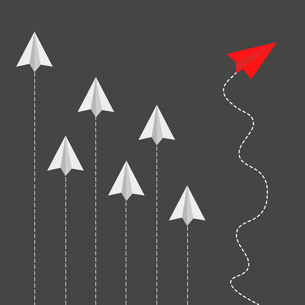 paper airplanes, one going in a different direction